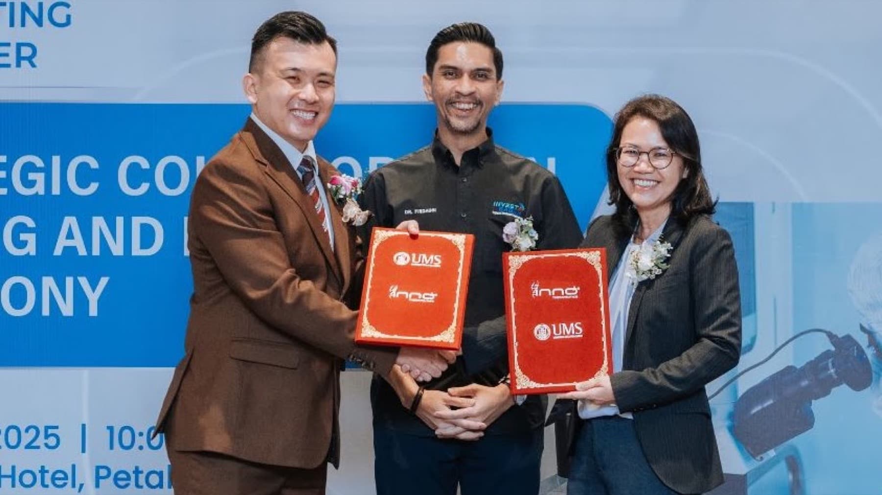 Exchanging agreements with Universiti Malaysia Sabah